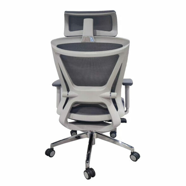Silla ejecutiva Corinto, está volteada de espaldas en su totalidad, es de color gris y tiene máximo soporte atrás