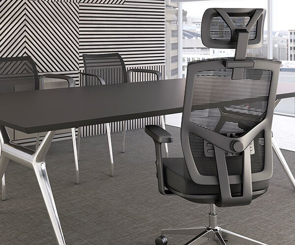 Silla ejecutiva Atkin N, está enfrente de un escritorio, dentro de una oficina, la silla está enfrente
